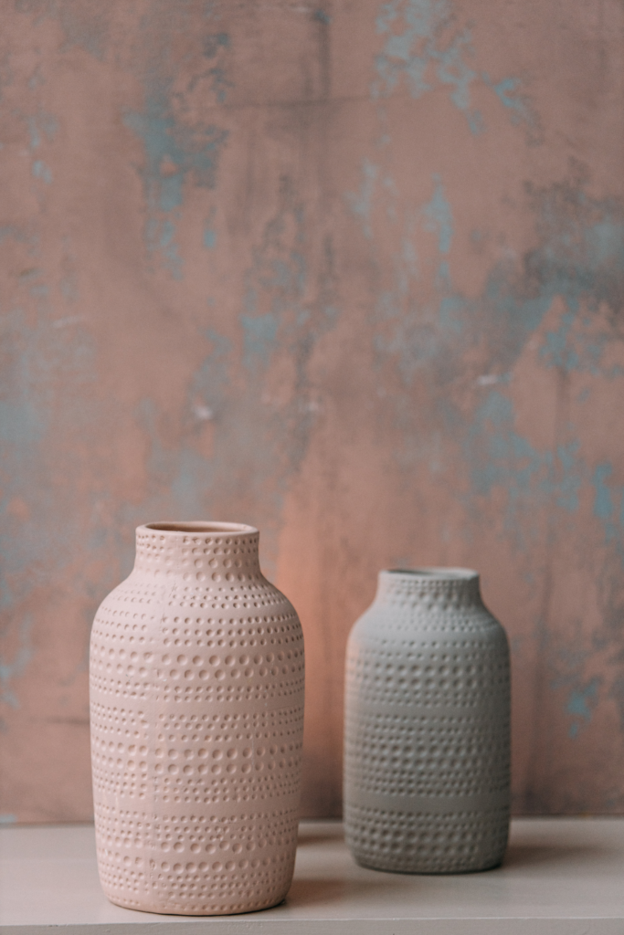 Minimalist ceramic vase set in neutral tones styled on a modern shelf, perfect for contemporary, Scandinavian, and budget-friendly home decor.