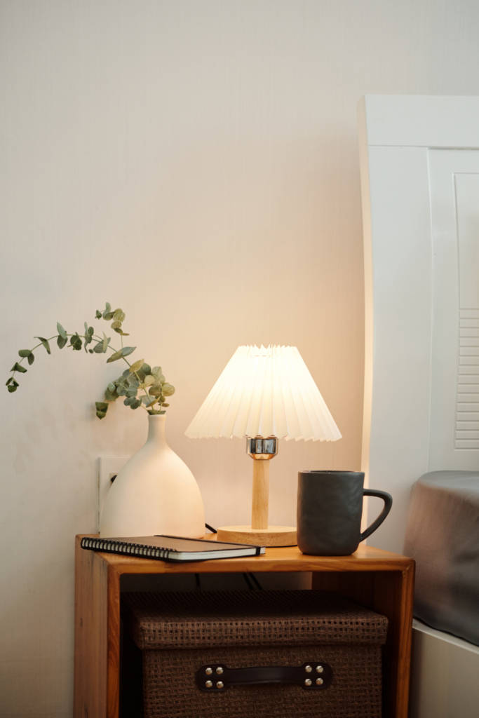 Modern table lamp with a sleek design on a side table, adding stylish, functional, and budget-friendly lighting for living rooms, bedrooms, and home decor.