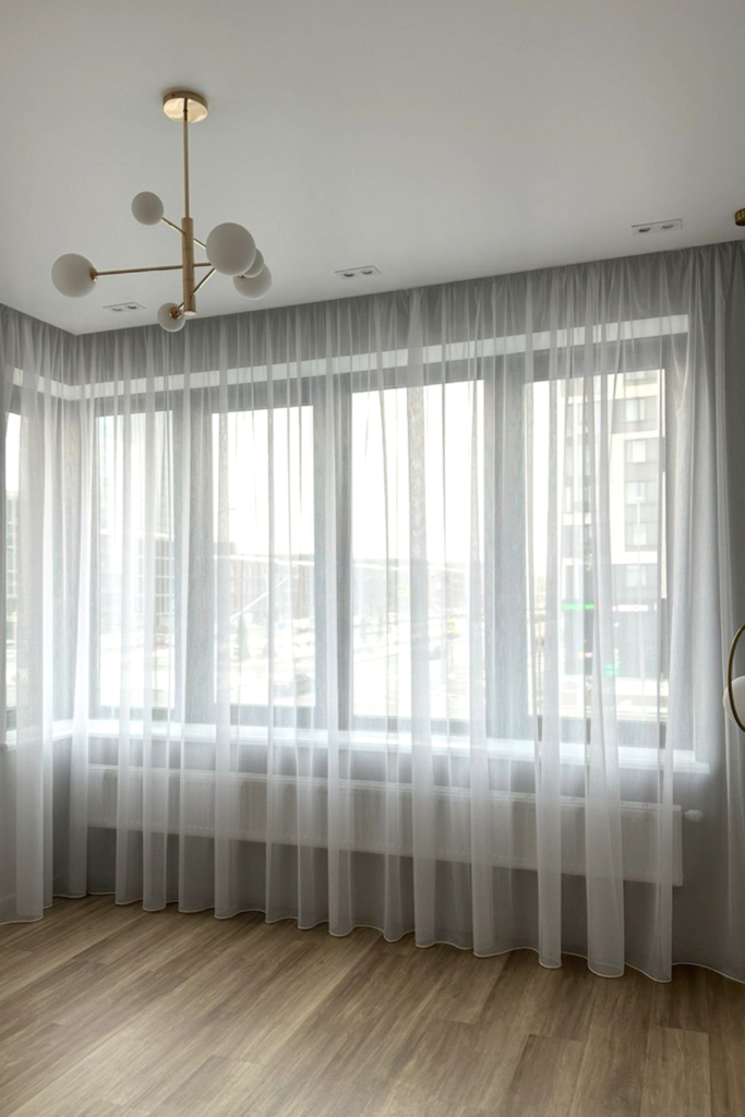 Light and airy linen curtains styled in a living room for an Amazon Living Room Refresh for Spring 2026