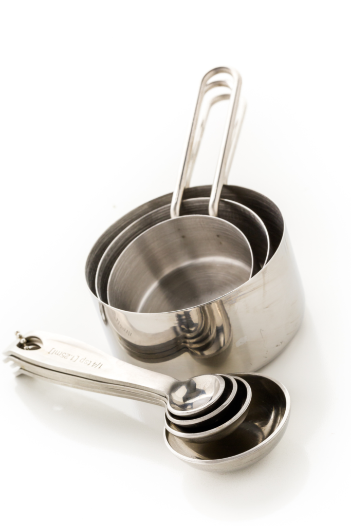 Durable stainless steel measuring cups and spoons with engraved measurement markings